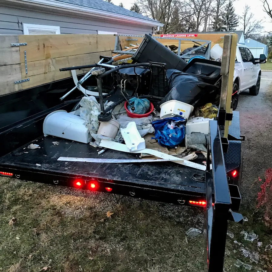 Roll-off dumpster delivered to a residential driveway in Highlands